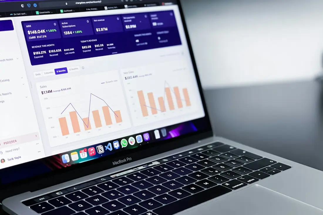A laptop showing a performance dashboard